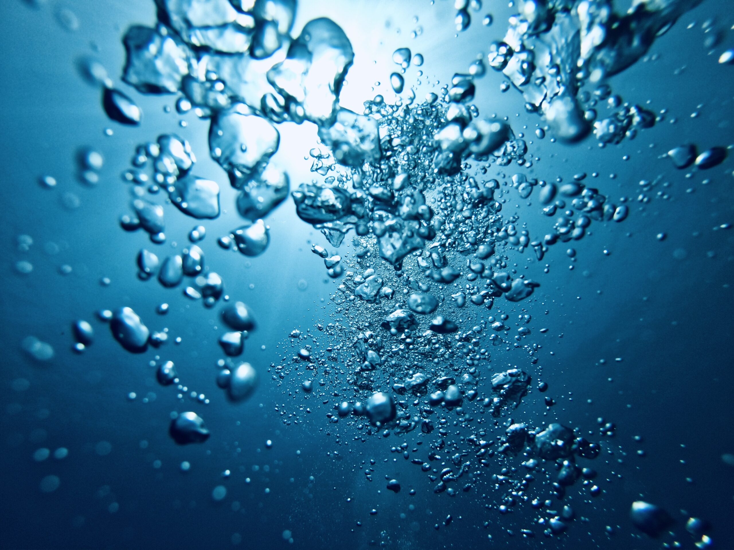 Water Treatment 1 Clayton Industries – Advanced Steam Boiler Technology air bubbles in blue water 2024 10 11 23 21 03 utc scaled Clayton Industries – Advanced Steam Boiler Technology