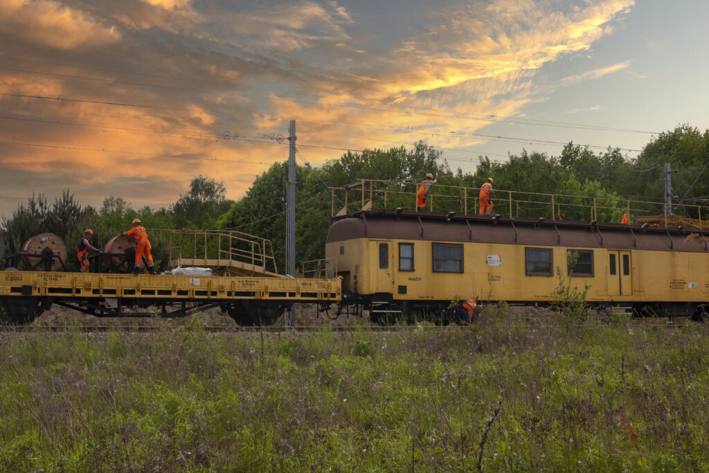 Industries 45 Clayton Industries – Advanced Steam Boiler Technology industrial railway train with construction workers 2023 11 27 04 53 23 utc Clayton Industries – Advanced Steam Boiler Technology